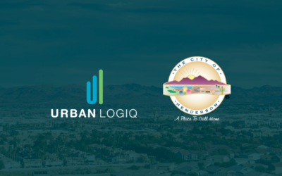 Blue letter u and green letter L ontop of words that read urbanlogiq to make up a logo and beside it you have the city of henderson nevada's logo which looks like a nude circle with purple mountains inside and the words the city of ontop and on the bottom of the circle the words Henderson. Both logos are ontop of a dark green background with a faded landscape